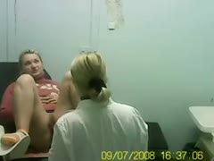 Hidden web camera movie of golden-haired lady on the gynecologist chair in the hospital
